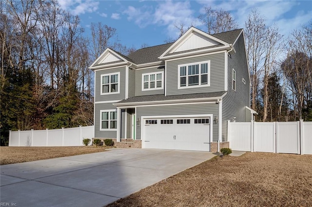 view of front of property with a garage and a front lawn