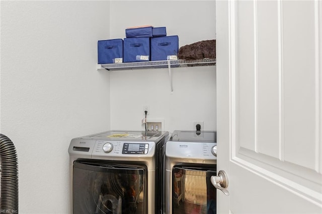 washroom featuring separate washer and dryer