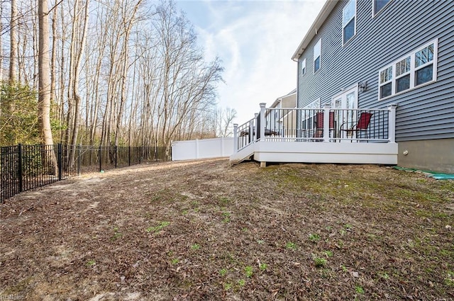 view of yard with a deck