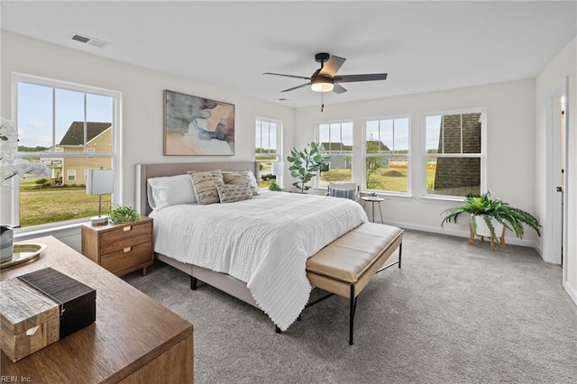 bedroom featuring ceiling fan and carpet floors