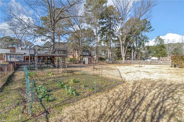 view of yard featuring a deck