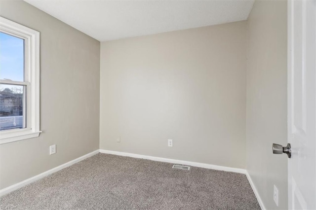 view of carpeted spare room