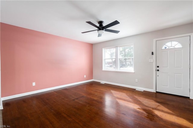 foyer entrance with ceiling fan, dark hardwood / wood-style flooring, and a healthy amount of sunlight