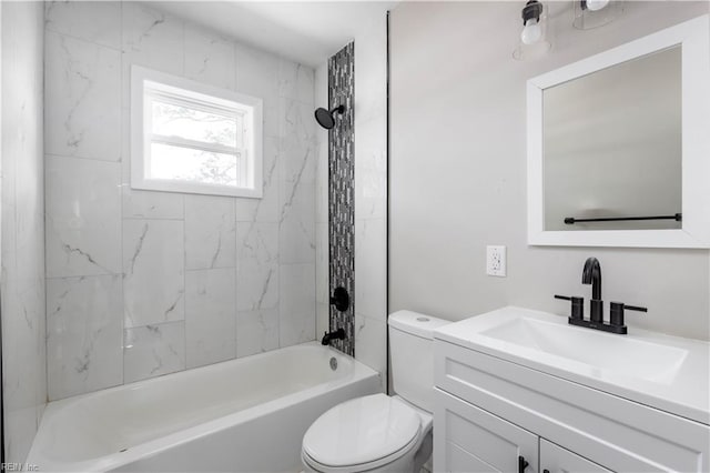 full bathroom with tiled shower / bath combo, toilet, and vanity