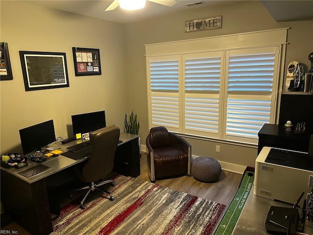 office space featuring hardwood / wood-style floors and ceiling fan