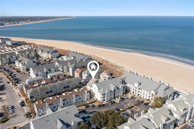 bird's eye view featuring a beach view and a water view