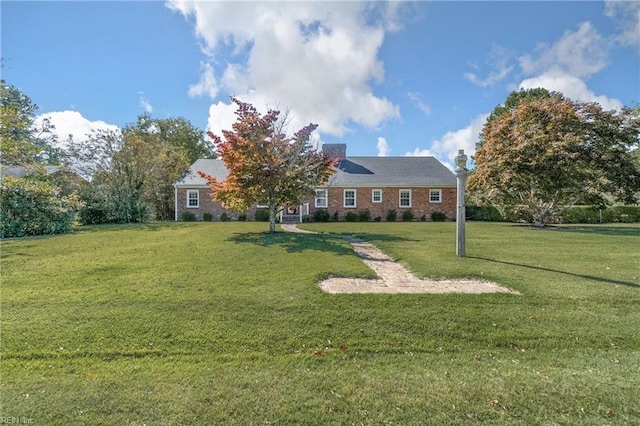 view of front of home with a front yard