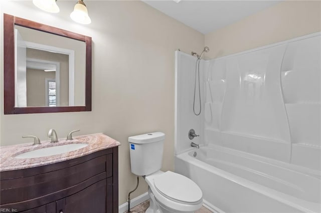 full bathroom with shower / bath combination, vanity, and toilet