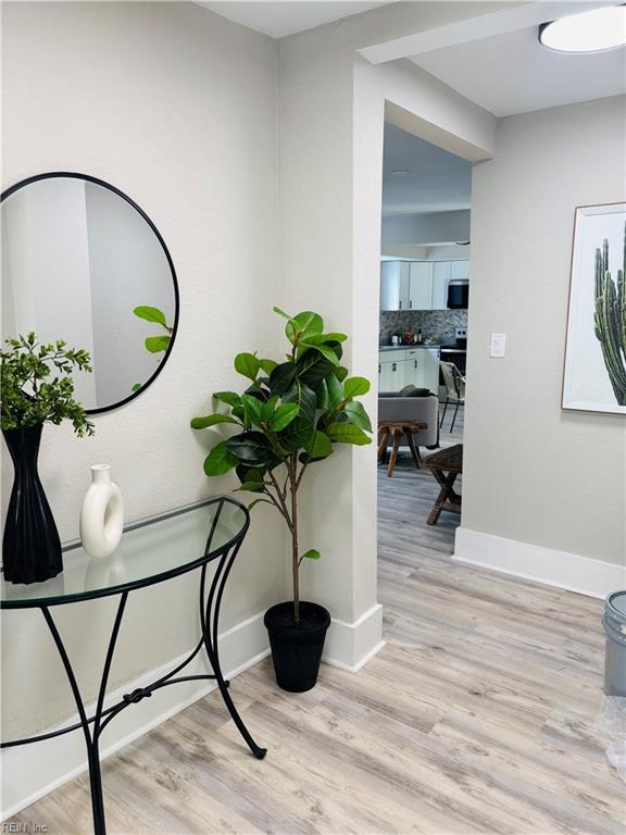 hall featuring light hardwood / wood-style floors