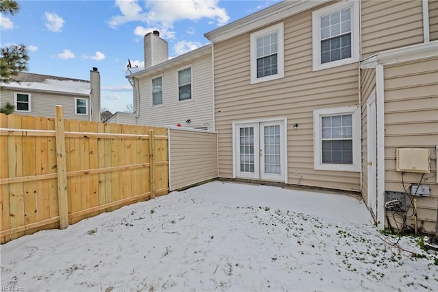 view of snow covered house