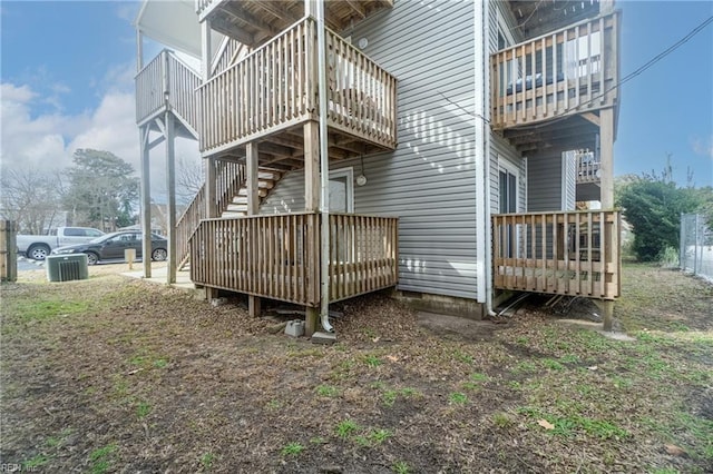 view of side of property featuring a deck