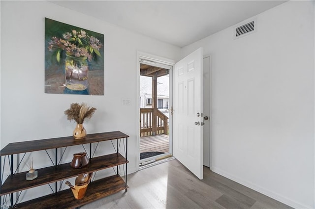 interior space with hardwood / wood-style flooring