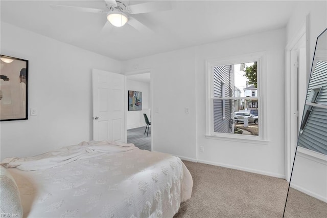 bedroom featuring ceiling fan and carpet flooring