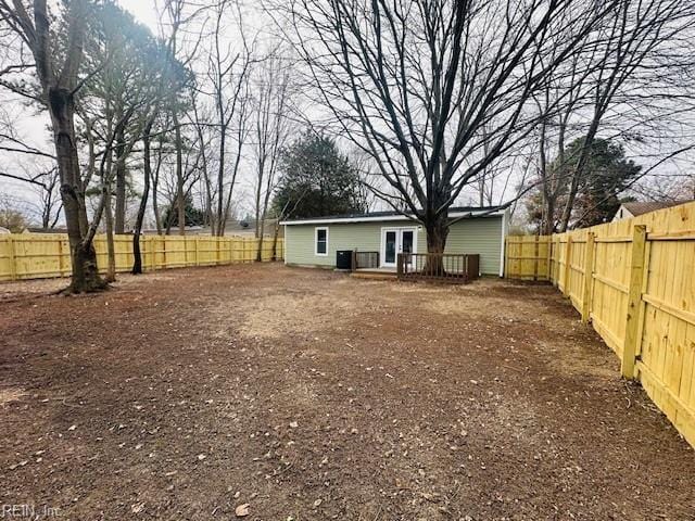 view of yard with a wooden deck