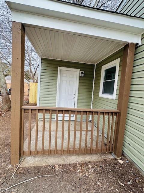 entrance to property with covered porch