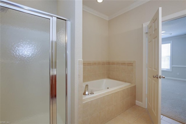 bathroom featuring ornamental molding, separate shower and tub, and tile patterned flooring