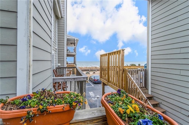 balcony featuring a water view