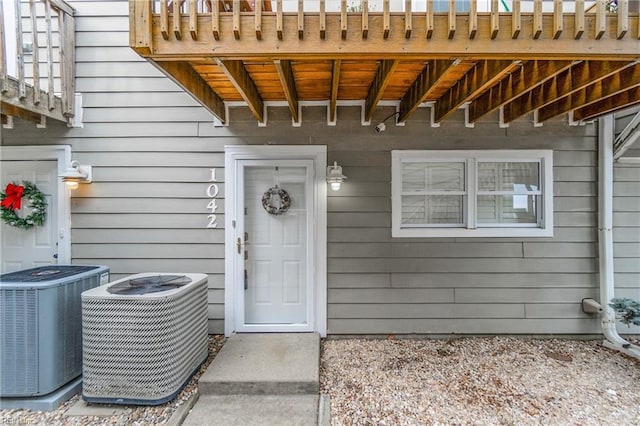 property entrance with central AC unit