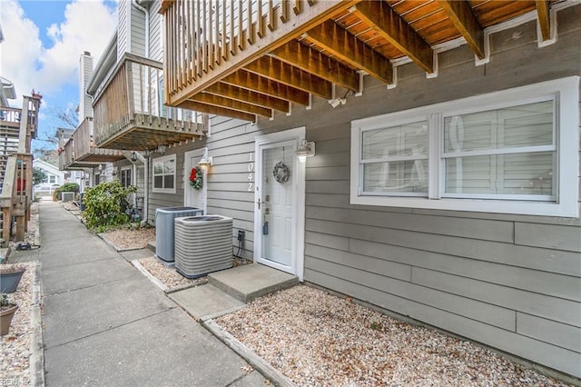 property entrance featuring central air condition unit