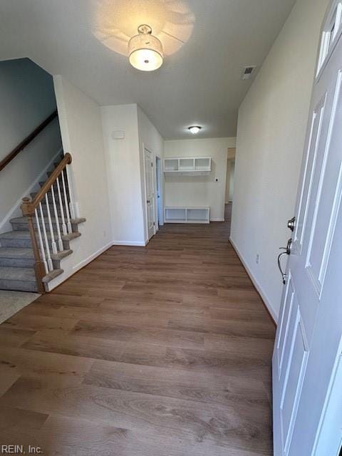 interior space with hardwood / wood-style flooring