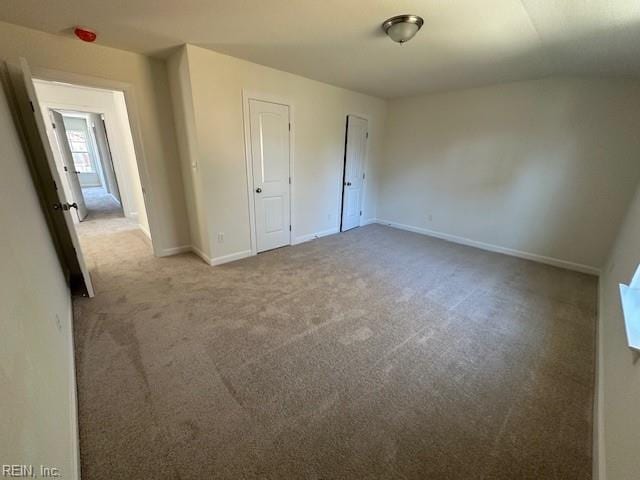 unfurnished bedroom with carpet flooring