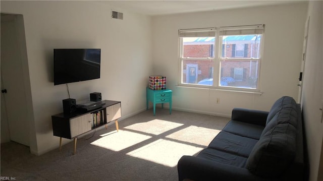 living room featuring light carpet