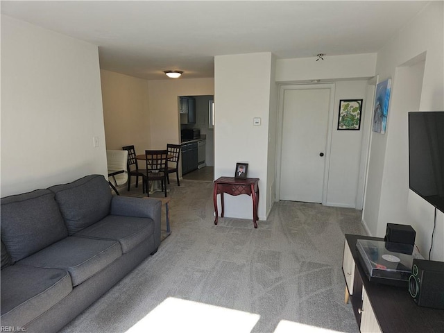 living room featuring light carpet