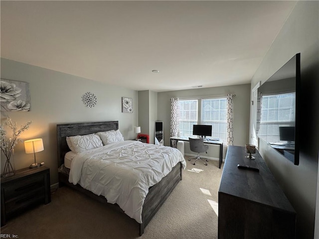 bedroom featuring carpet