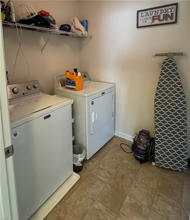 laundry area featuring independent washer and dryer