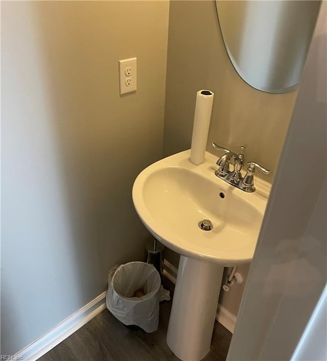 bathroom featuring hardwood / wood-style flooring