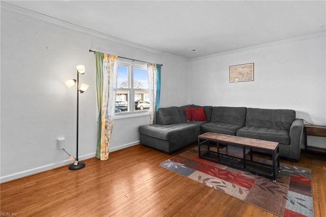 living room featuring ornamental molding and hardwood / wood-style floors