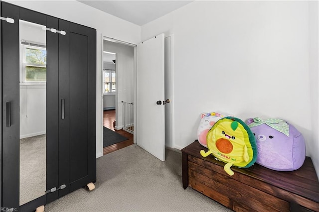 bedroom with light carpet