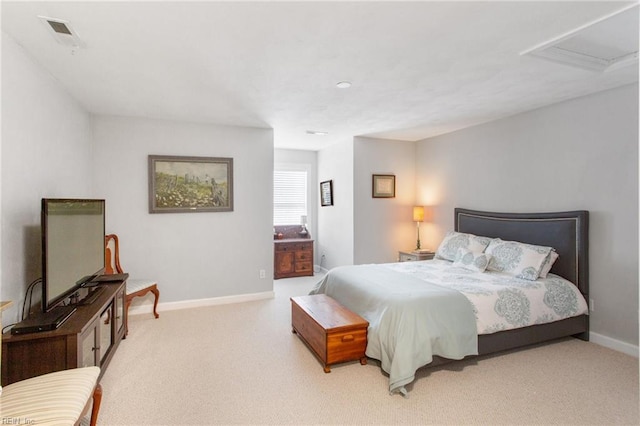 bedroom featuring light carpet