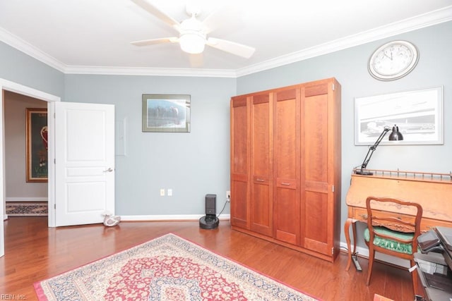 miscellaneous room with ceiling fan, ornamental molding, and wood-type flooring