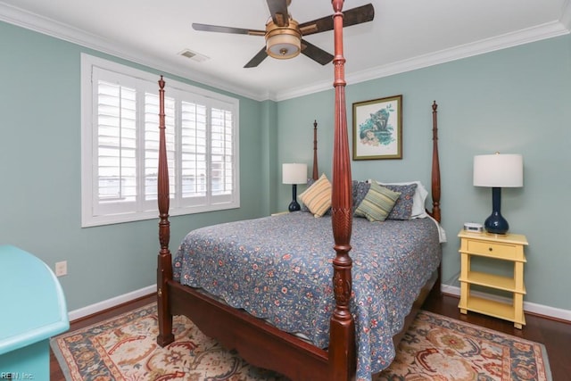 bedroom featuring crown molding, wood-type flooring, and ceiling fan