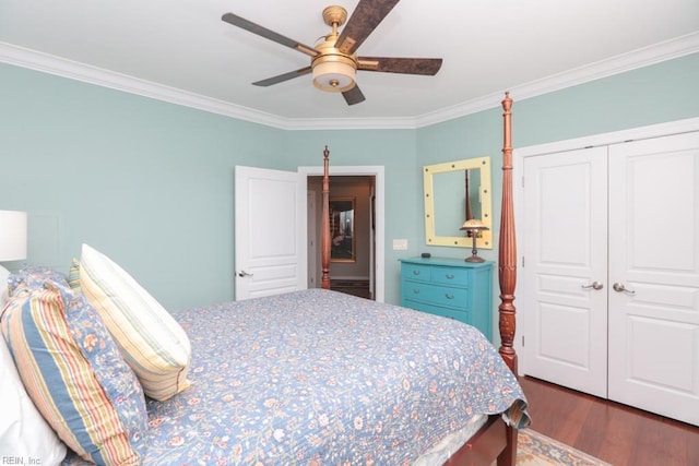 bedroom with ceiling fan, dark hardwood / wood-style flooring, a closet, and crown molding