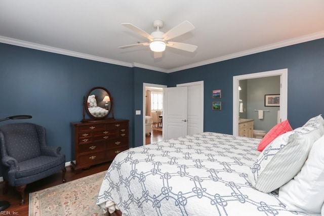 bedroom with ceiling fan, connected bathroom, and ornamental molding