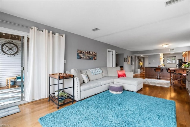 living room with hardwood / wood-style floors