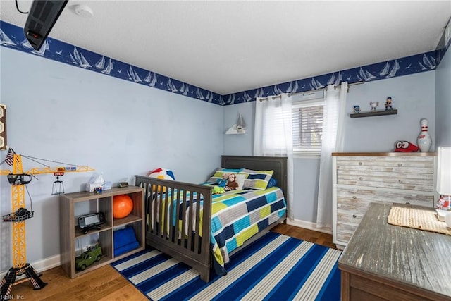 bedroom featuring hardwood / wood-style floors