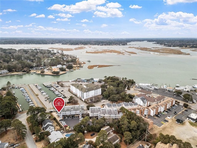 birds eye view of property featuring a water view