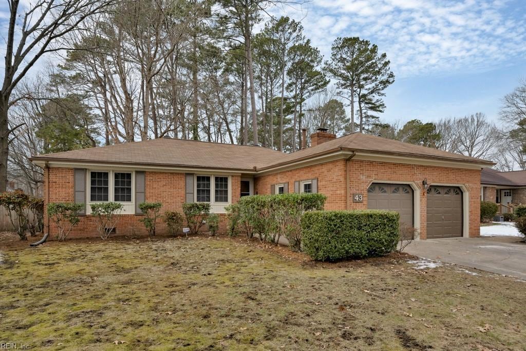 single story home with a garage