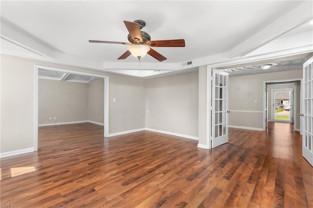 unfurnished room featuring ceiling fan, dark hardwood / wood-style floors, and french doors