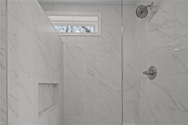 details with a tile shower