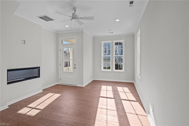 unfurnished living room featuring crown molding, hardwood / wood-style floors, and ceiling fan