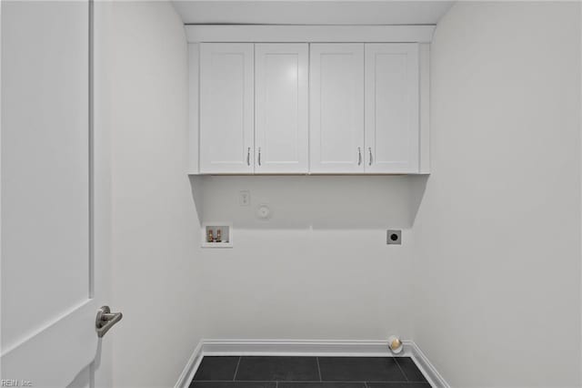 clothes washing area featuring baseboards, gas dryer hookup, hookup for a washing machine, tile patterned flooring, and hookup for an electric dryer