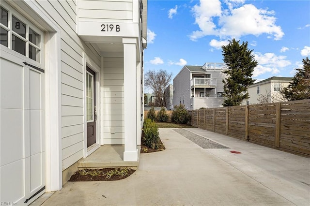 property entrance featuring fence