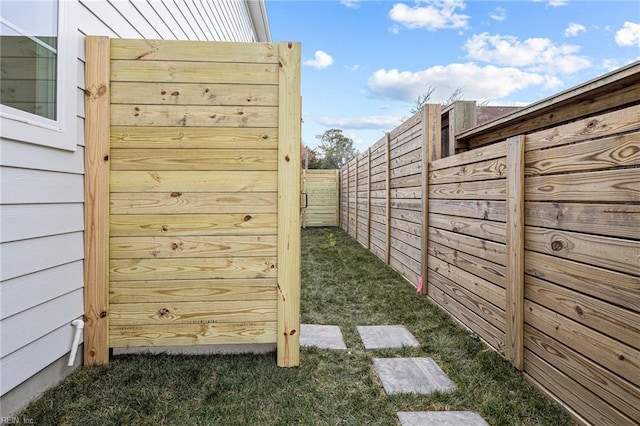 exterior space featuring a fenced backyard