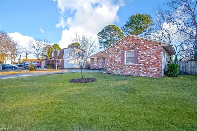 view of front of home with a front lawn