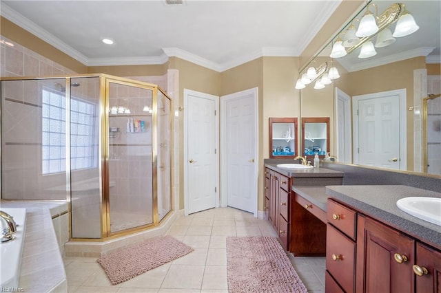 bathroom featuring shower with separate bathtub, vanity, ornamental molding, and tile patterned flooring