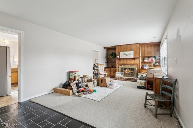 living room with a fireplace